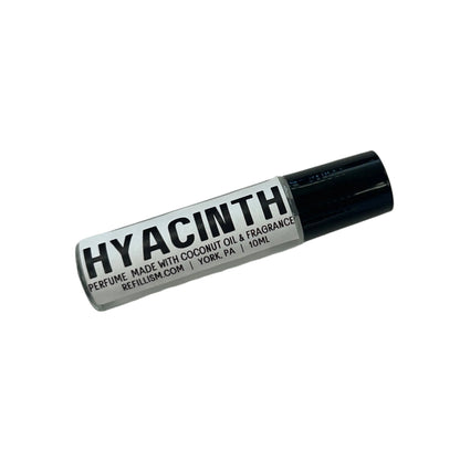 Roll-up container labeled 'Hyacinth' on a gray surface with wooden side.