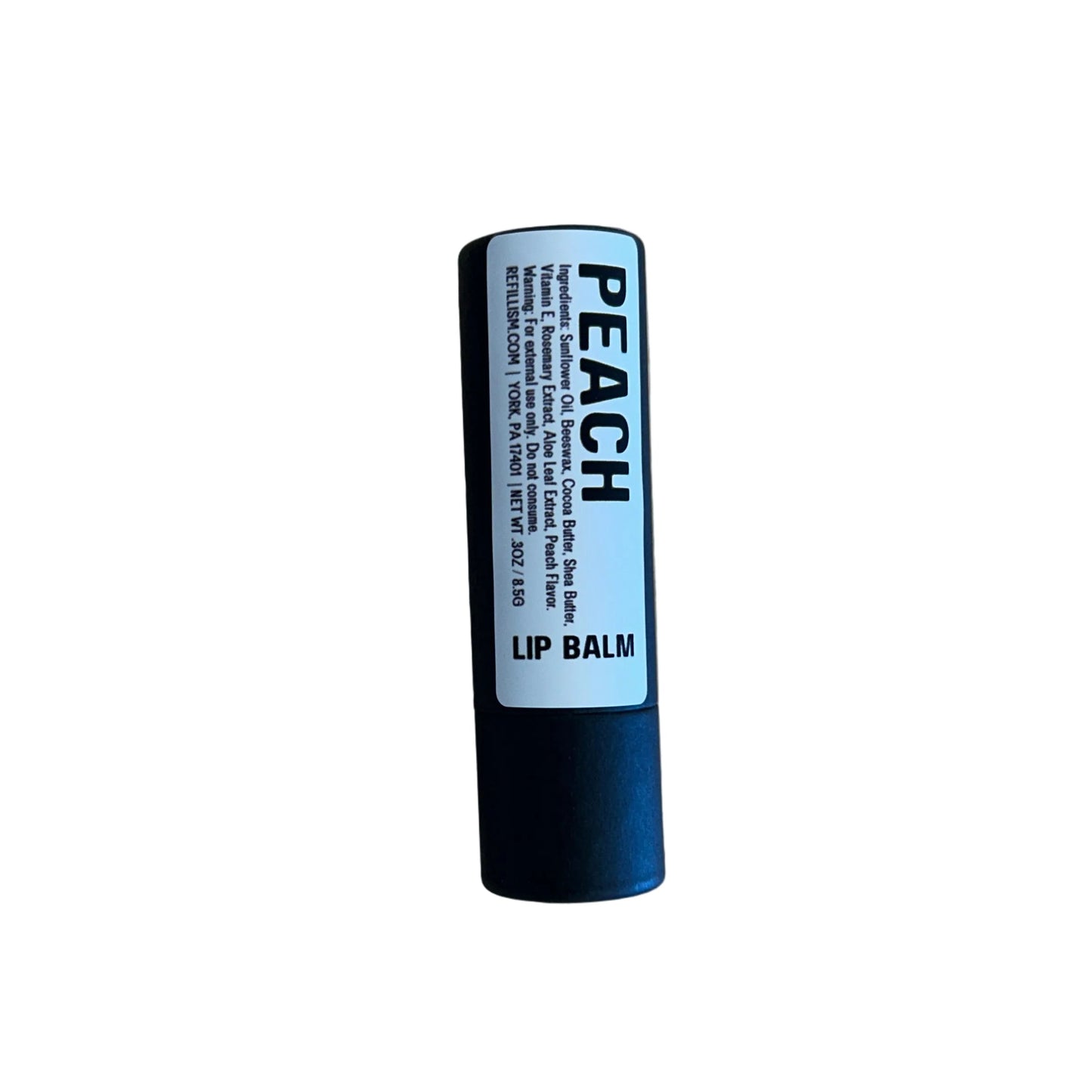 Lip balm stick labeled 'Peach' on a white background