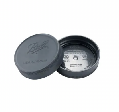 Ball brand leak-proof container lid on a white background